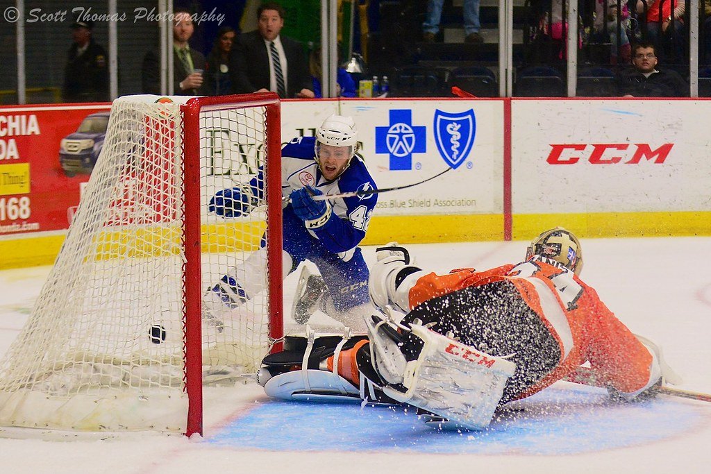 "Hockey Action" by Scott Thomas Photography is licensed under